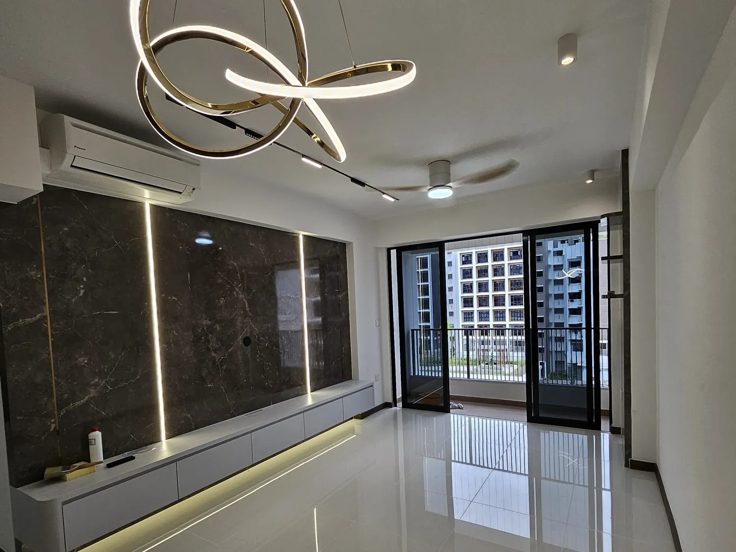 Living room with a sculptural pendant